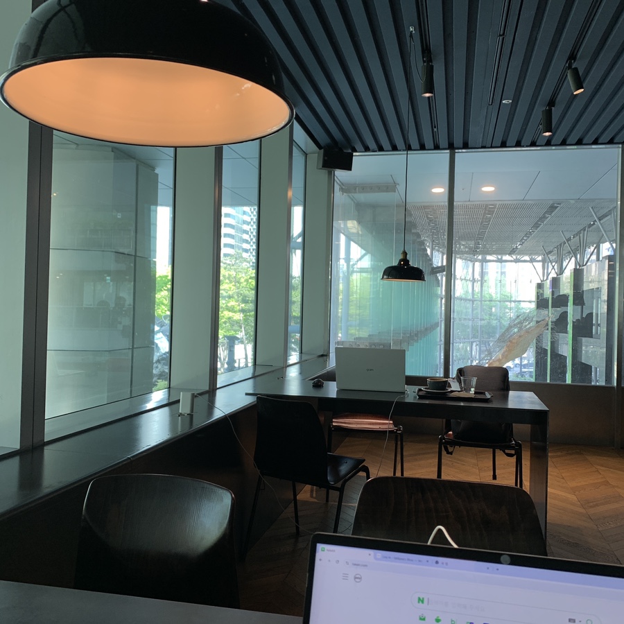 laptop seating area inside Samseong Station Cafe near COEX