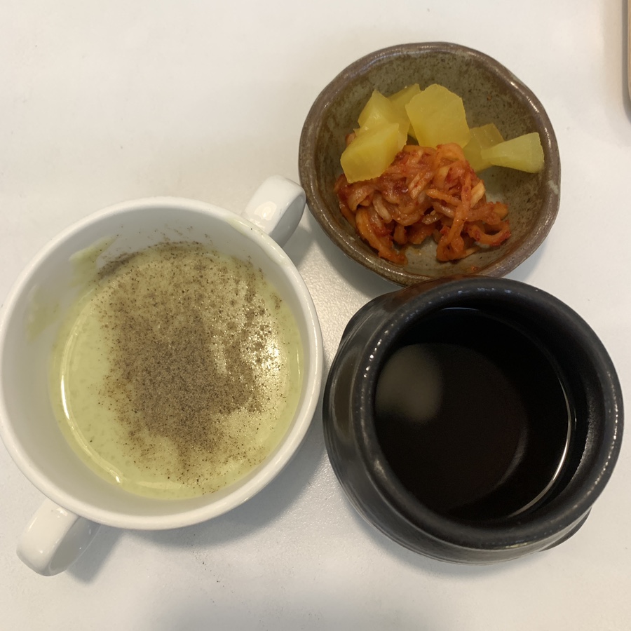 Self-service soup and side dishes at Garosugil Pork Cutlet restaurant