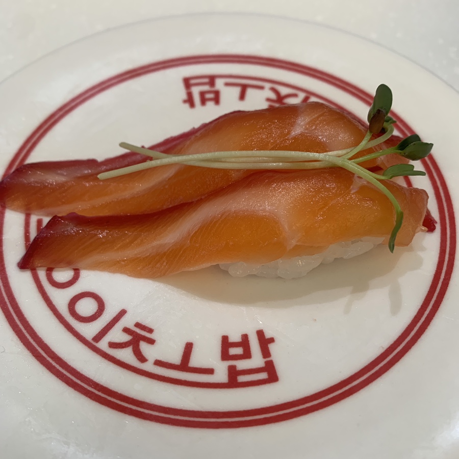 smoked salmon sushi at conveyor belt sushi busan