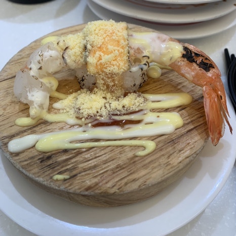 shrimp sushi with creamy sauce at gwangalli sushi restaurant