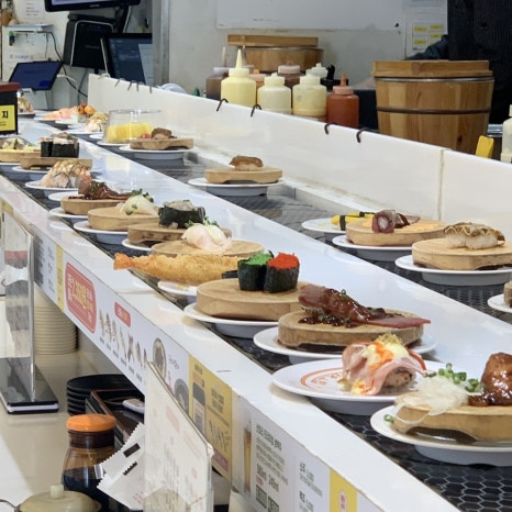 conveyor belt sushi full table at yongi sushi gwangalli