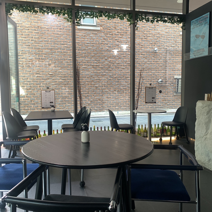 cozy seating area inside Seokchon Lake cafe