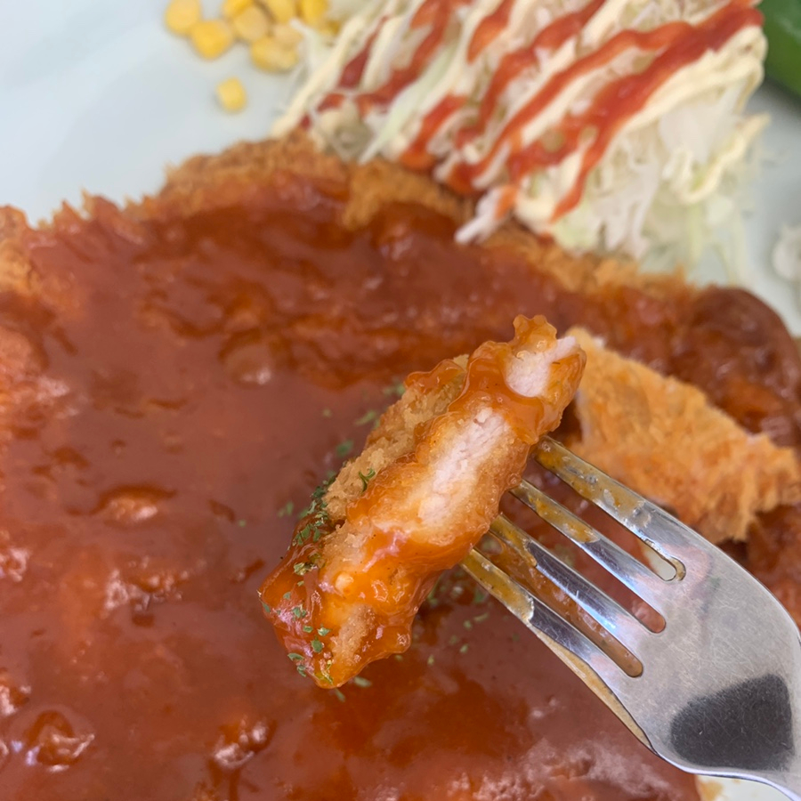 crispy tonkatsu close up with rich brown sauce Korean style