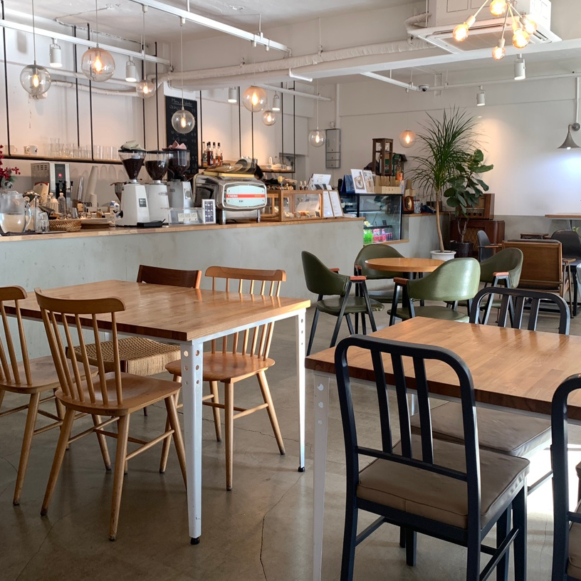 spacious cafe interior wooden tables and coffee bar cafe wonder seoul