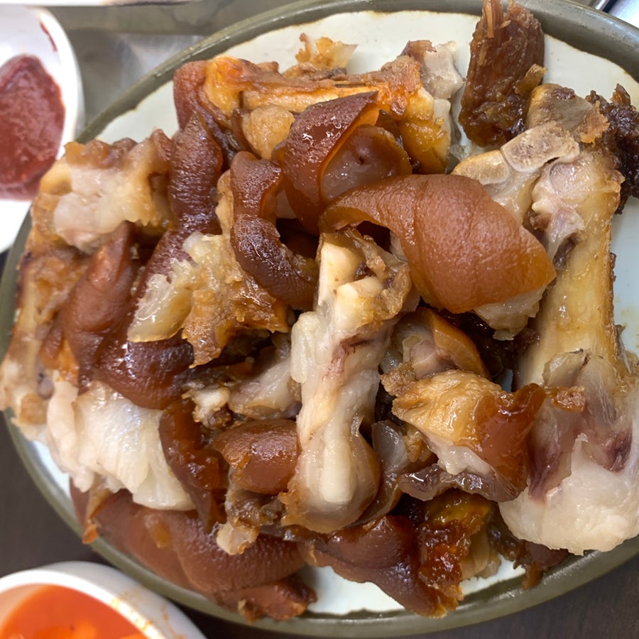 Braised pork head meat served on plate close-up