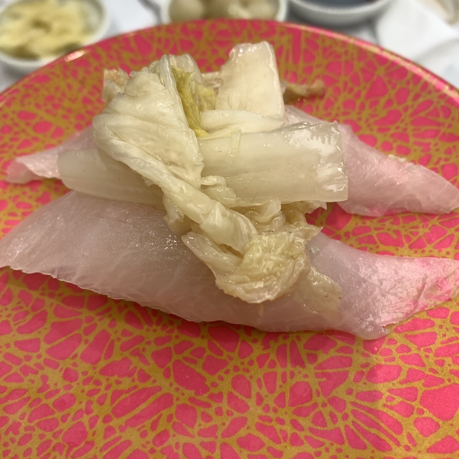 Pickled kimchi sushi at fish on the rice Wirye