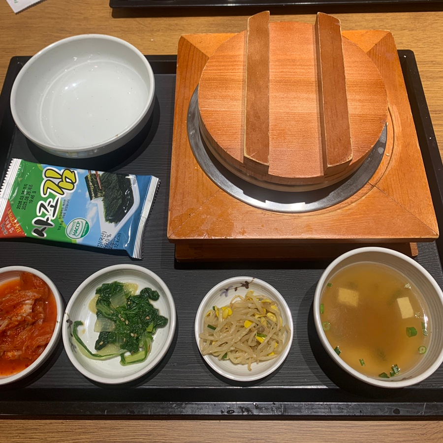 Covered hot stone pot rice at a Korean sotbap restaurant