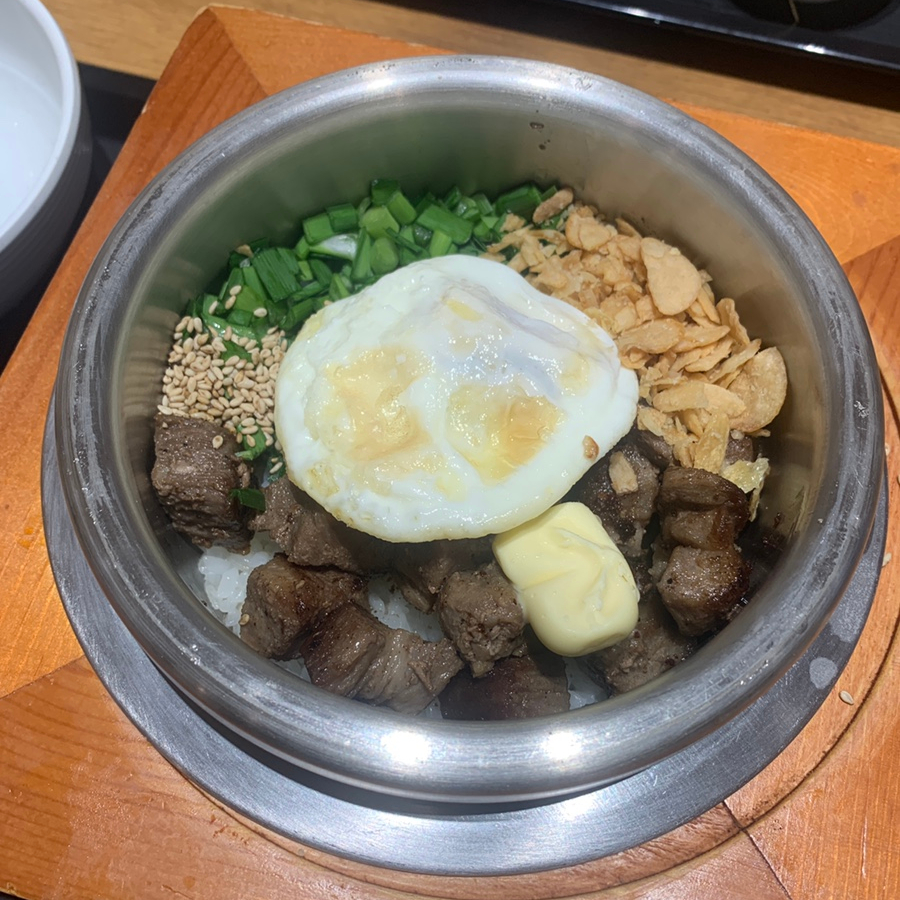Korean hot stone pot rice meal with side dishes