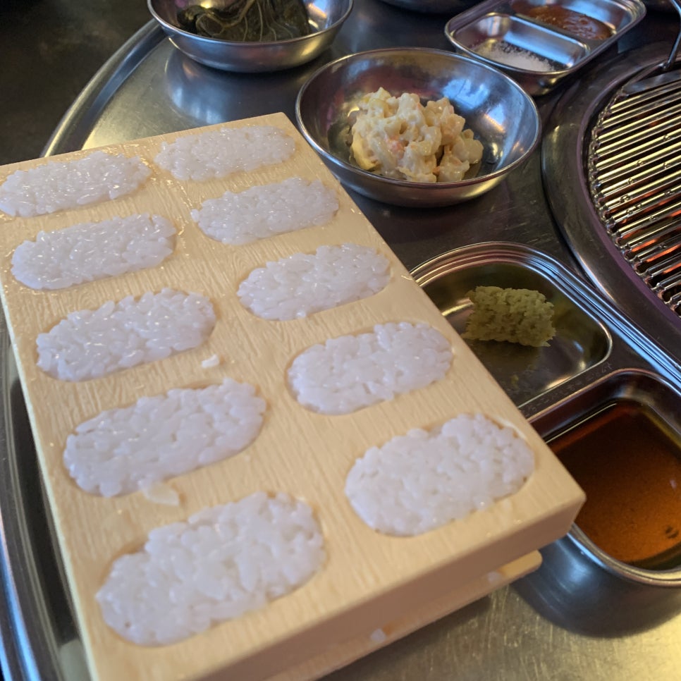 Sushi rice pieces served with Korean BBQ in Gangneung