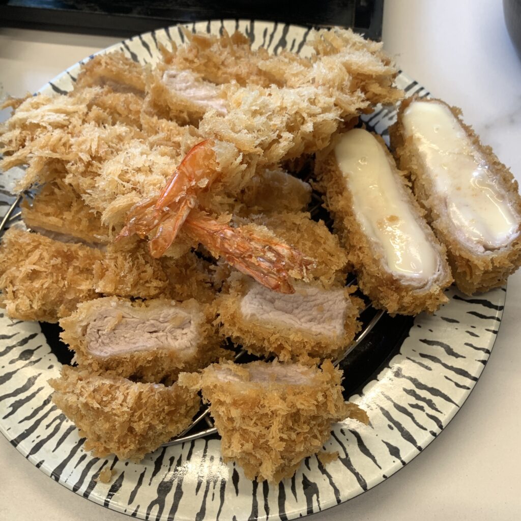 Wirye Tonkatsu at Midon with pork loin, tenderloin, mozzarella cheese katsu, and fried shrimp