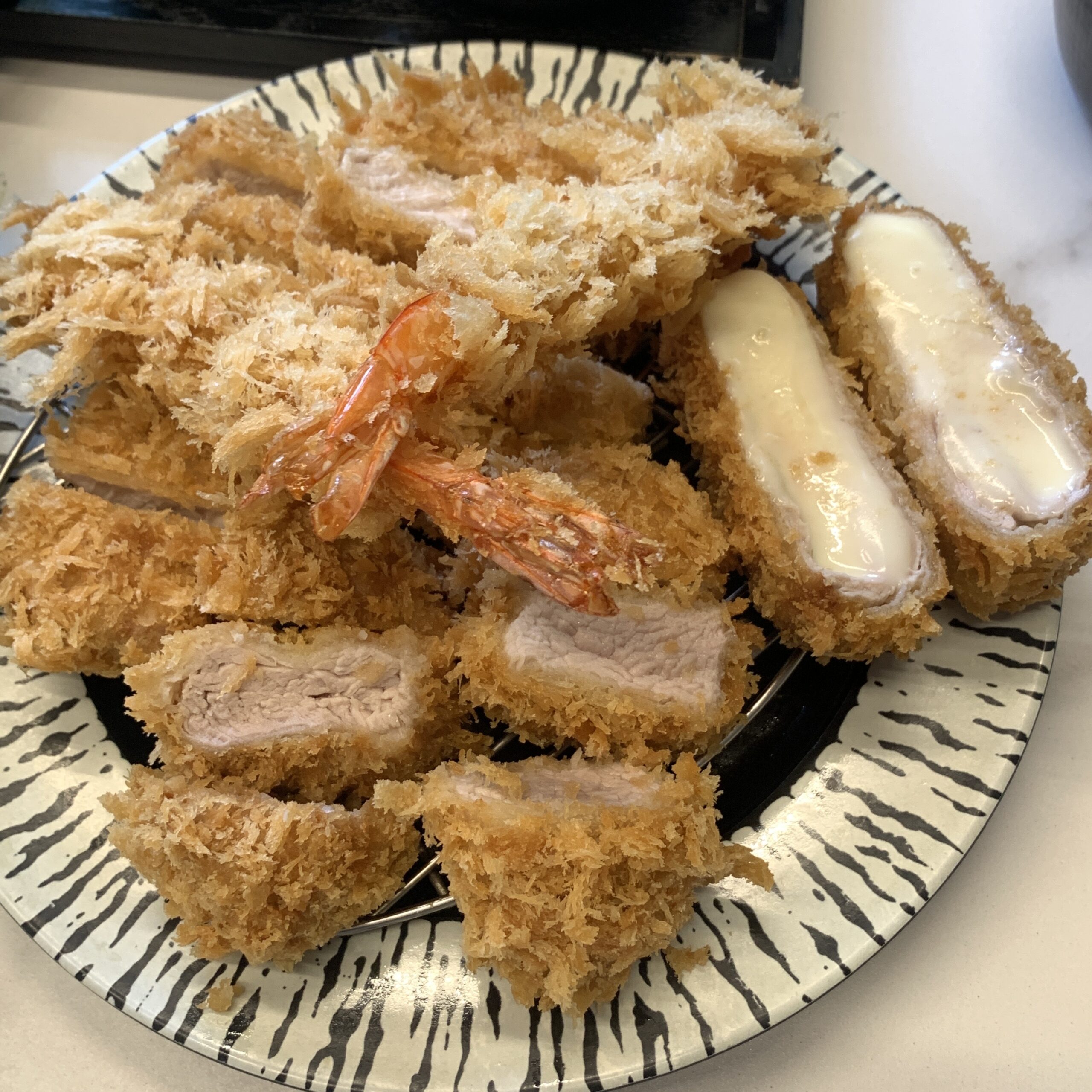 Wirye Tonkatsu at Midon with pork loin, tenderloin, mozzarella cheese katsu, and fried shrimp